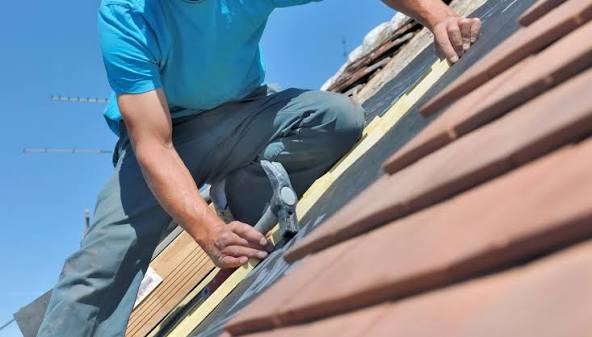 Emergency Roof Tarping Guide: Temporary Repair & Costs